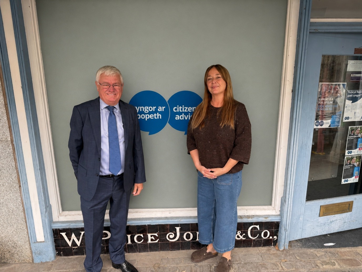Adrian Mason MS with Julie Pierce outside Citizens Advice in Denbigh